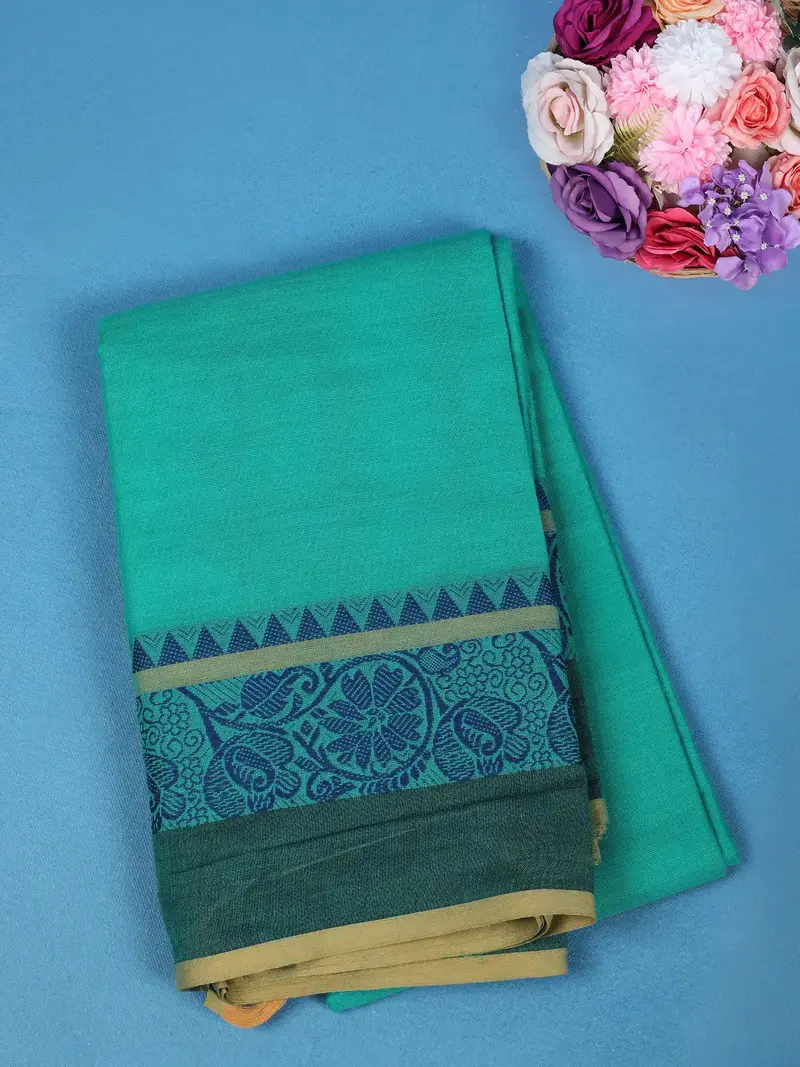 Teal Green Solid Cotton Saree With Blue Floral Design Border 1