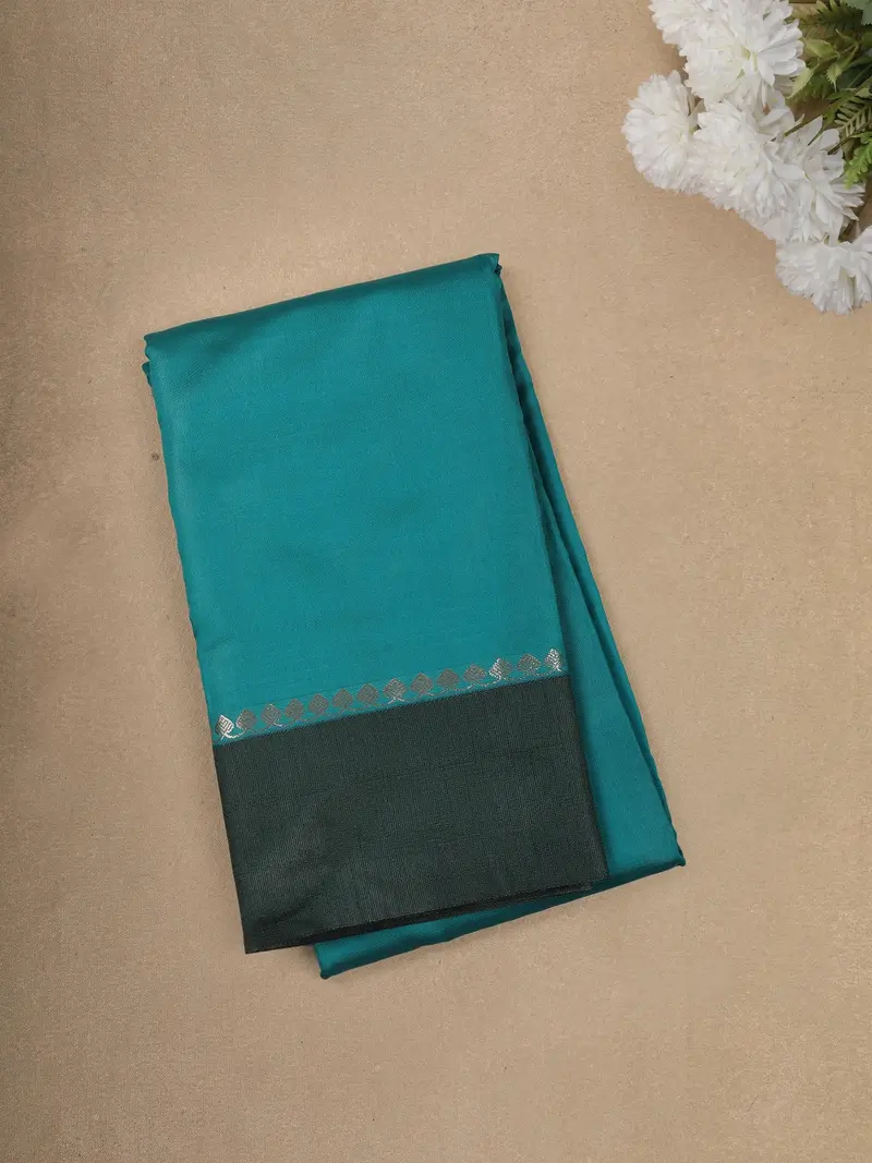 Teal Green Solid Design Semi Silk Fancy Wear Saree With Contrast Border 1