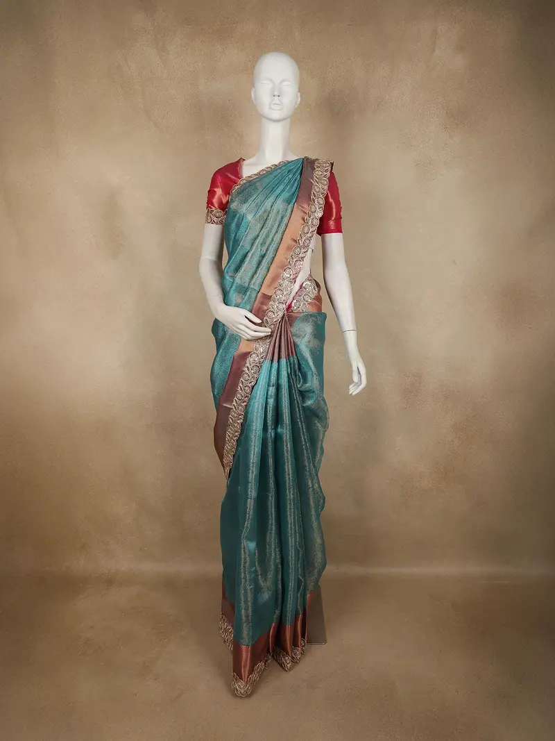 Teal Green Zari Woven Design Tissue Silk Saree With Designer Border 1