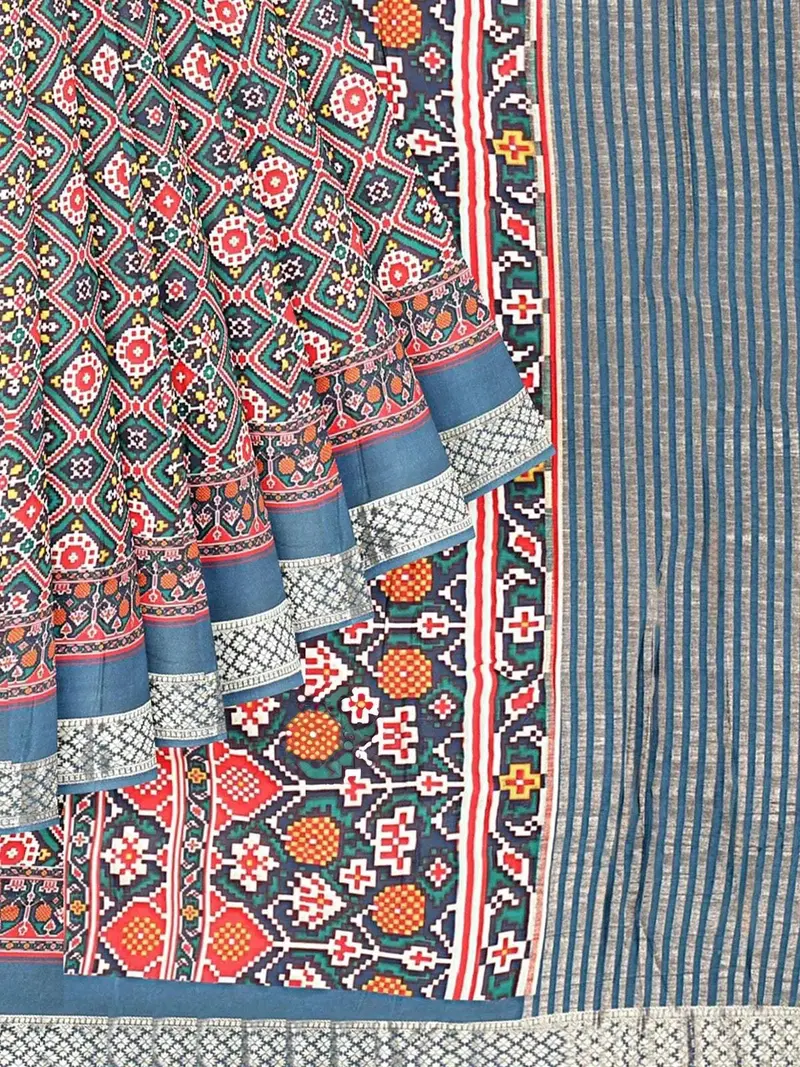 Teal Semi Tussar Silk Saree With Patola Prints On The Body And Zari Border 1