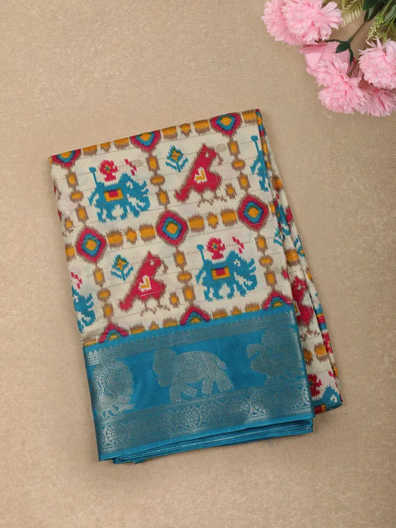 Turquoise Blue Geometric Ikat-Inspired Design Mixed Cotton Saree With Ornamental Zari Woven Border 1