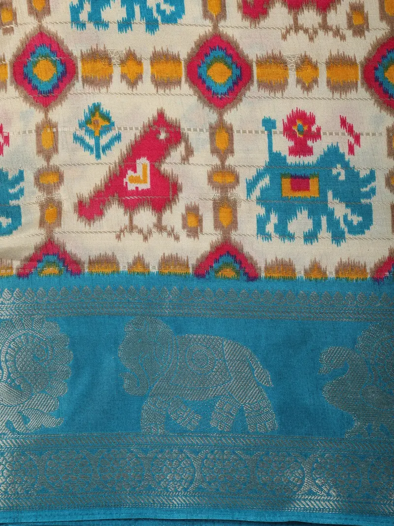 Turquoise Blue Geometric Ikat-Inspired Design Mixed Cotton Saree With Ornamental Zari Woven Border 2