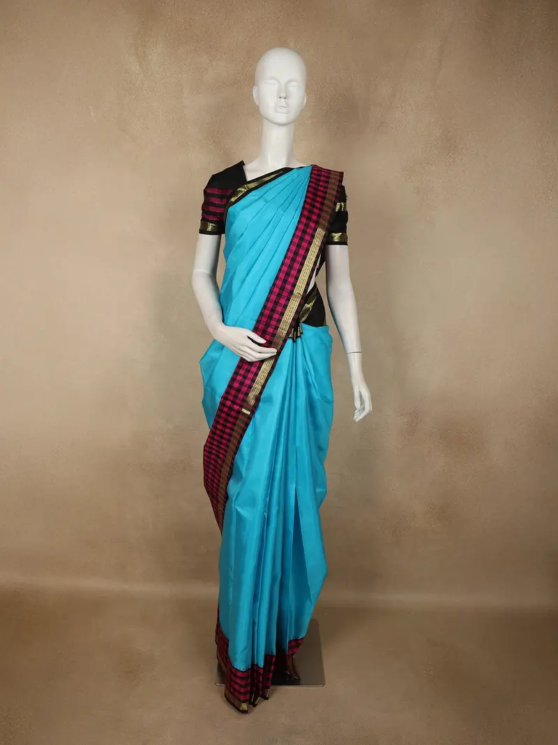 Turquoise Blue Solid Woven Design Pure Kanchipuram Silk Saree With Contrast Border 1