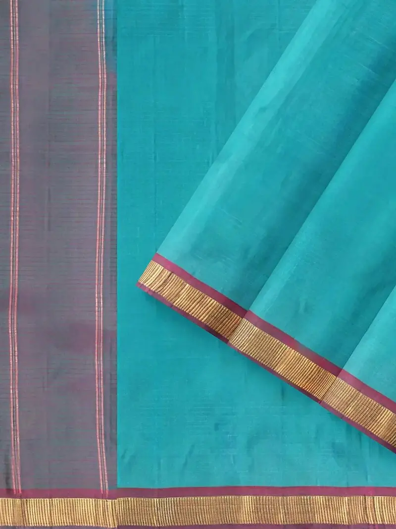 Turquoise Green Silk Saree With Plain Body And Contrast Zari Border 2