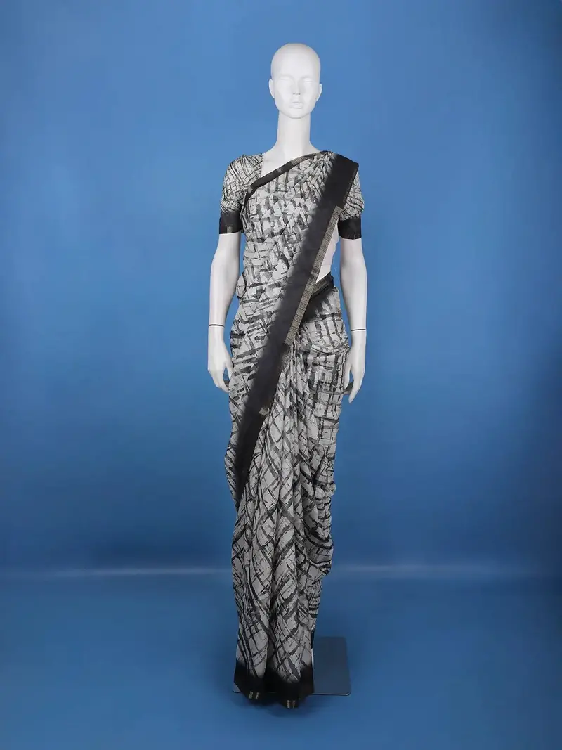 White Abstract Printed Semi Tussar Saree With Contrast Border 1