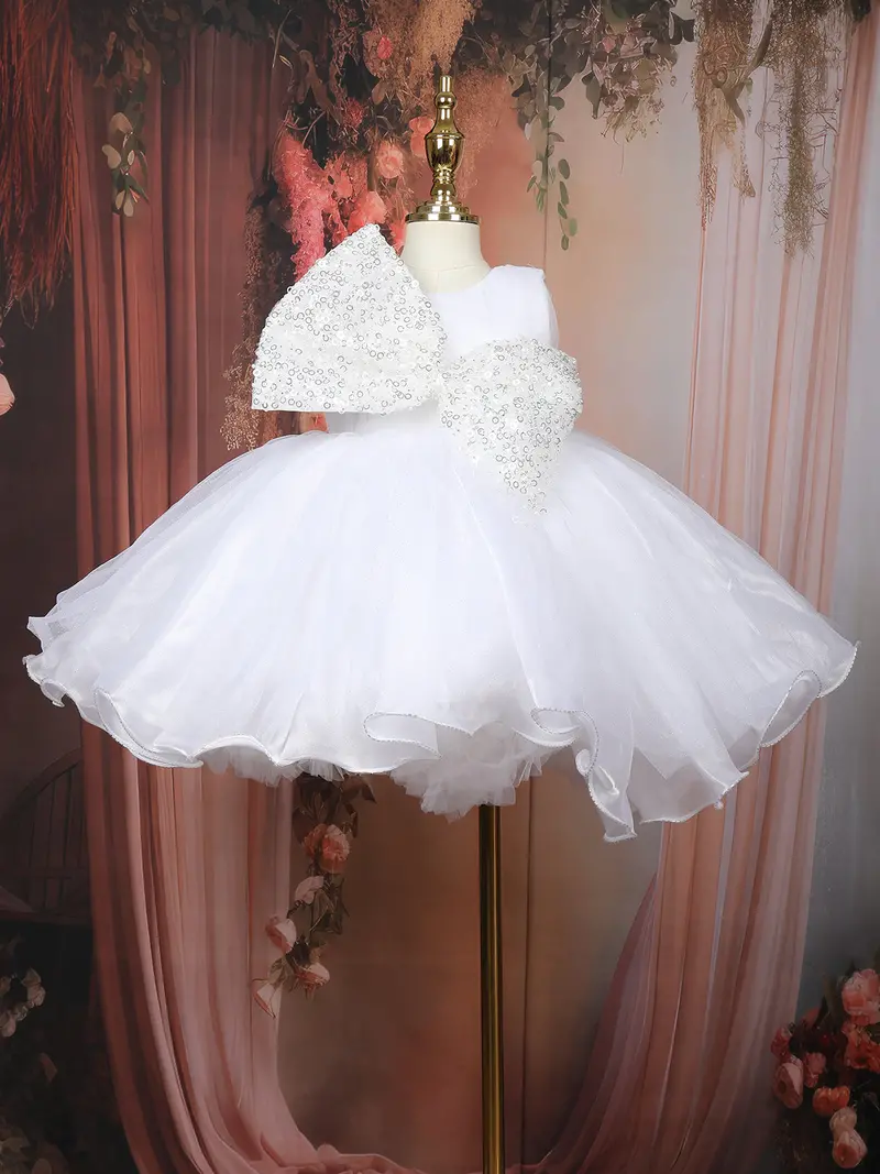 White Flared Sequin Design Net Frock With Oversized Bow 1
