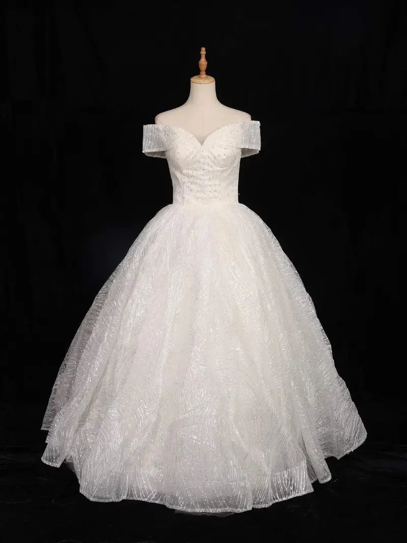 White Net Off-Shoulder Ball With Floral Threadwork And Sequins Gown 1